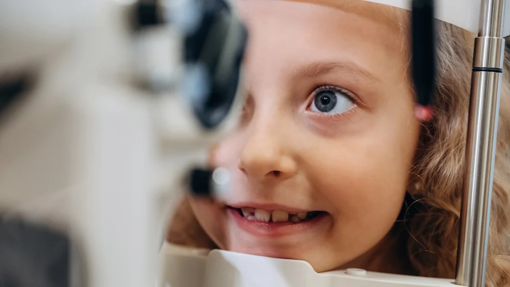child at eye exam